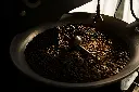 unsplash_QT-GwKOoddg_roasting coffee.webp